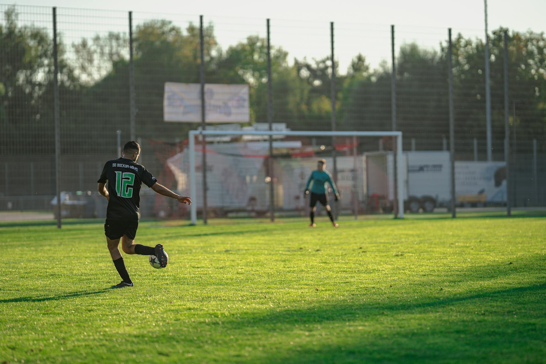 two players on a soccer field